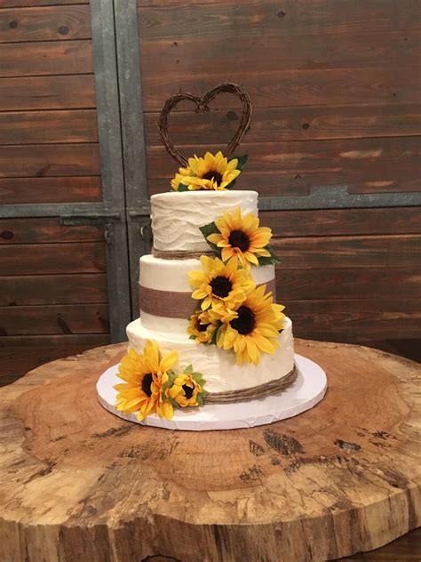 Sunflower Wedding Cakes Always Bring A Smile To Our Face Rustic Weddings And Their Flora