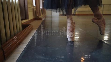 Close Up A Ballerina In Pointe Shoes Dancing On The Floor Stock Video