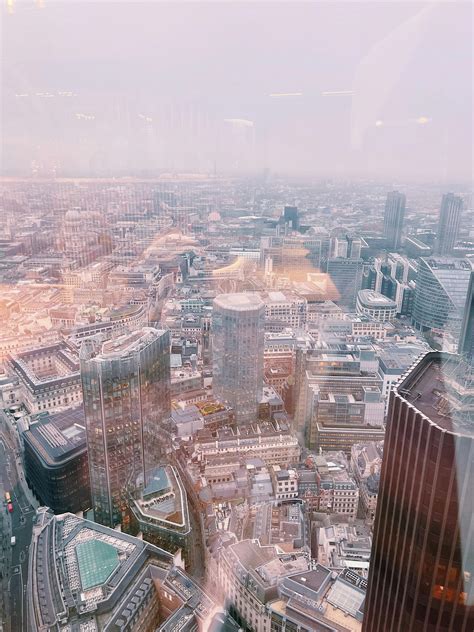 Aerial View Of City Buildings During Night Time · Free Stock Photo