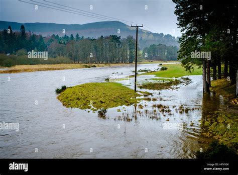 The River Tweed In Flood In The Tweed Valley Between Broughton And