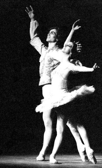 Two Ballerinas In White Tutu And Black Background