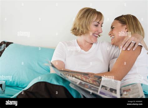 Lesbian Couple Hugging In Bed Stock Photo Alamy