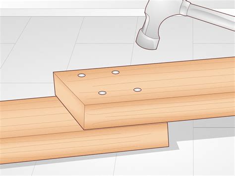 Cómo clavar un clavo sin partir la madera 10 Pasos