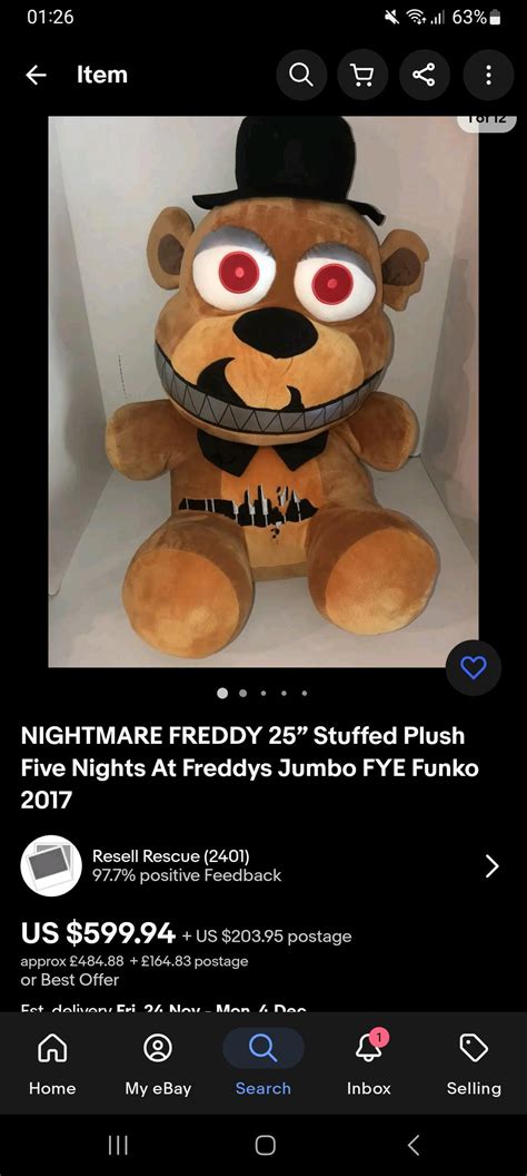 I got my large Funko Nightmare Freddy plush from out of the attic ...