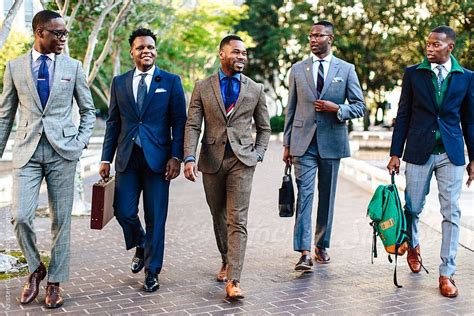 Group Of Businessmen Walking Downtown By Stocksy Contributor Kristen