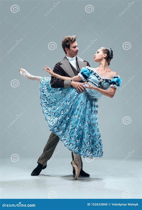 Contemporary Ballroom Dancers On Grey Studio Background Stock Photo