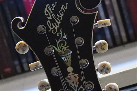gibson faces payment   million  debt  summer