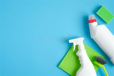 Cleaning Supplies On Blue Background Top View Cleaner Spray Bottle