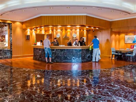 People At Reception Desk In Hotel Lobby In Dubai Editorial Stock Image