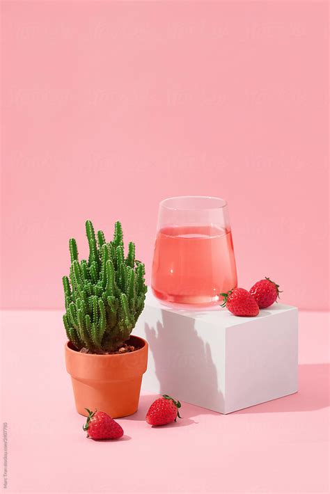 Glass Of Strawberry Juice On Red Background By Stocksy Contributor Marc Tran Đồ Uống