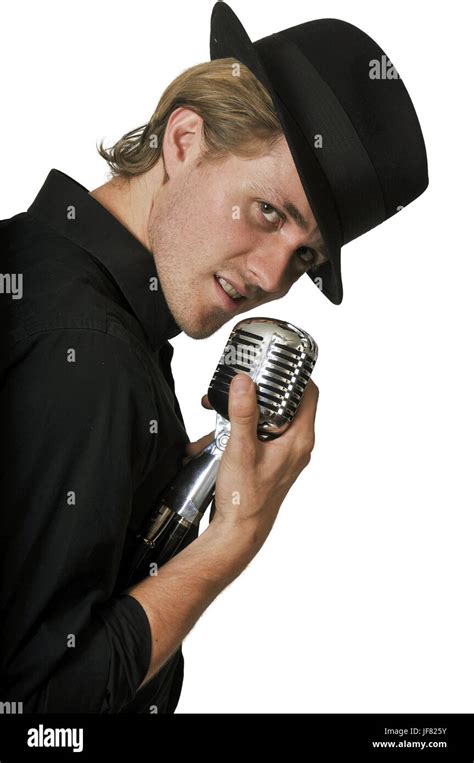 Man Singing Into Microphone Stock Photo Alamy