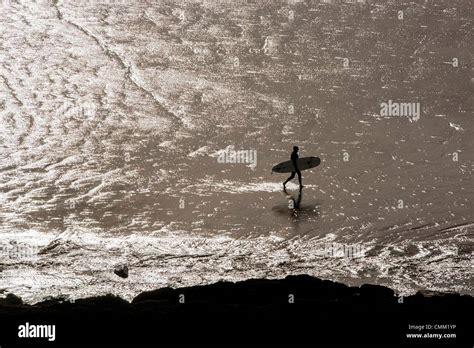 Saunton Beach Devon UK 4th November 2013 Silhouetted Surfers