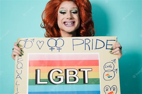 Premium Photo Happy Drag Queen Holding Lgbt Banner Focus On Face