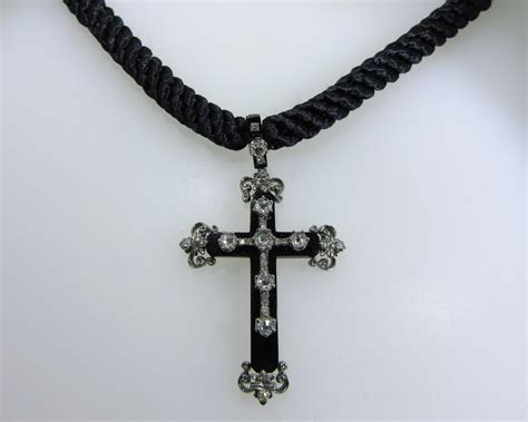 Diamond And Black Onyx Cross Pendant On Black Rope