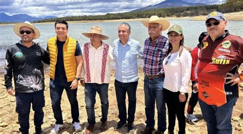 COMPESCA Compesca siembra 50 mil crías de tilapia en la presa de Cointzio