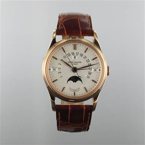 Watch Guru - Patek Philippe - Perpetual Calendar Moon Phase Ref: 5050R