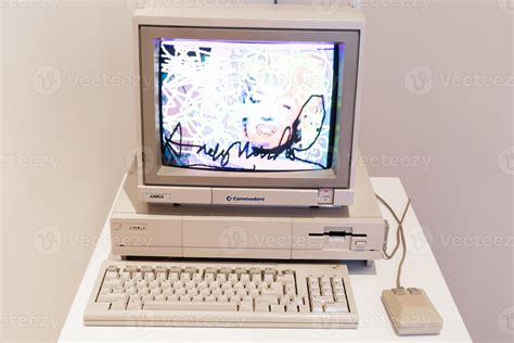 Computer Commodore Amiga With Floppy Disk And Mouse Stock