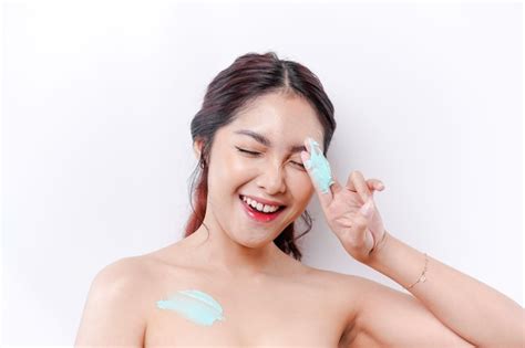 Premium Photo Skin Care Products Concept Asian Woman Applying Moisturizing Lotion On Body