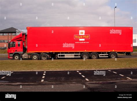 A red Royal Mail articulated lorry travelling along the Kingsway West ...