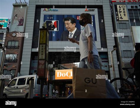 A Monitor Shows The Press Conference Of Japans Prime Minister Shinzo