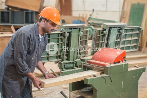 Workers In Industrial Cutting Wood Factory Royalty Free Stock Image