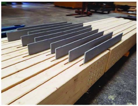 Glulam Beams Jointed With Mechanical Slotted In Steel Plate Connections