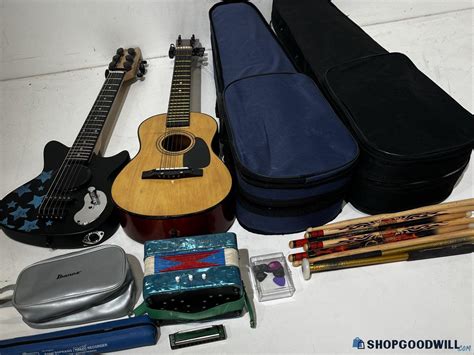 musical instruments  guitars violins harmonica