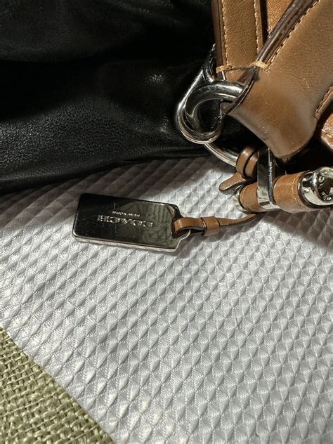 Coach Nomad Clovetanned Leather Hobo Bag Gem