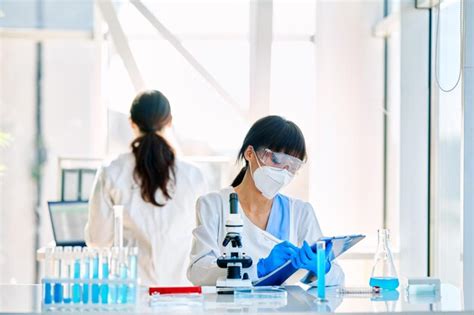 premium photo science teacher  students team working