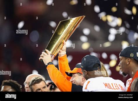 Clemson Tigers Head Coach Dabo Swinney Holds Up The National