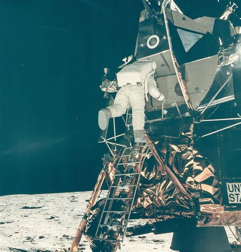 Neil Armstrong Buzz Aldrin Climbs Down The Ladder Of The LM Eagle