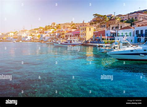 Boats In Port Of Town Emporio Nimborio Capital Of Island Of Halki