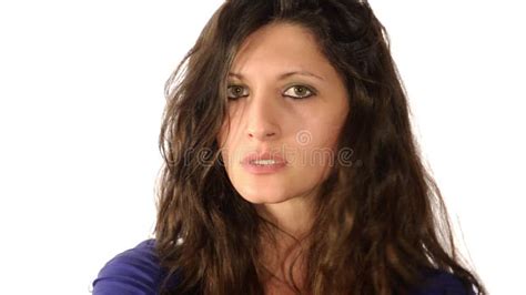 Nervous Brunette Waiting For Friend On Bench In Park Looking Around