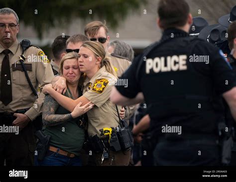 Law Enforcement Members Comfort Each Other After St Croix County