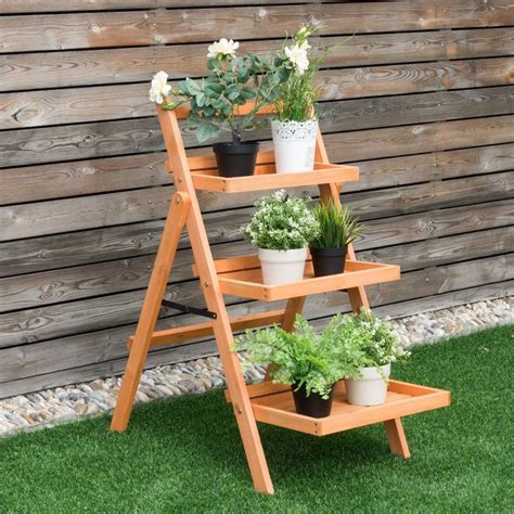 Three Tiered Wooden Plant Stand With Potted Plants