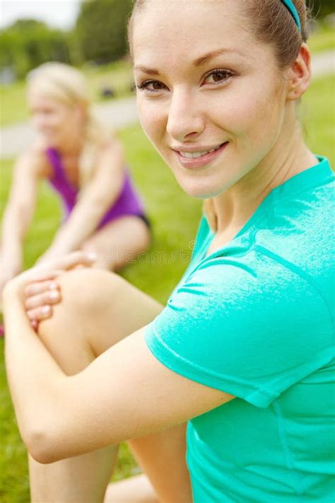 Happy To Be Stretching Outdoors Cropped Side View Of Female Athlete