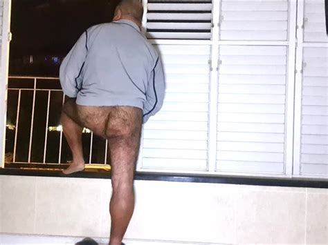 Bottomless Daddy Waiting In Balcony Hoping To Get Caught The Happily