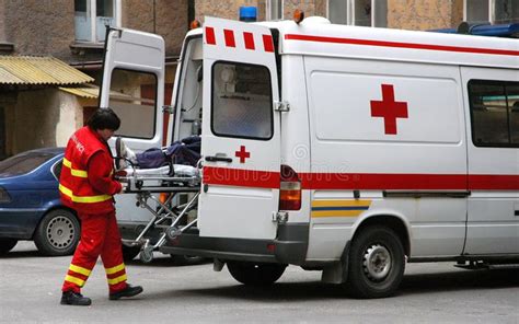 Ambulance Rescue With Patient On Special Litter In Ambulance Car Ad