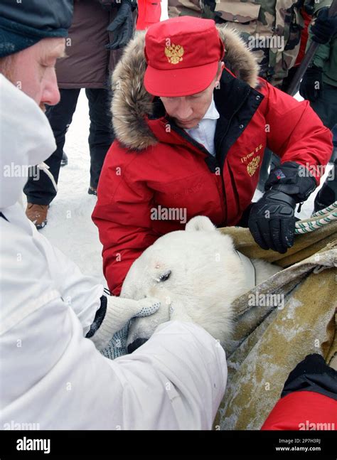 Russian Prime Minister Vladimir Putin Right Fixes A Radio Beacon On A