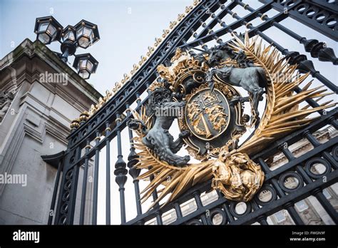 Royal Coat Of Arms On The Gates At Buckingham Palace London England