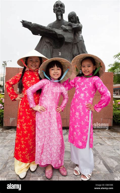 Vietnam Ho Chi Minh City Girls Dressed In Traditional Vietnamese