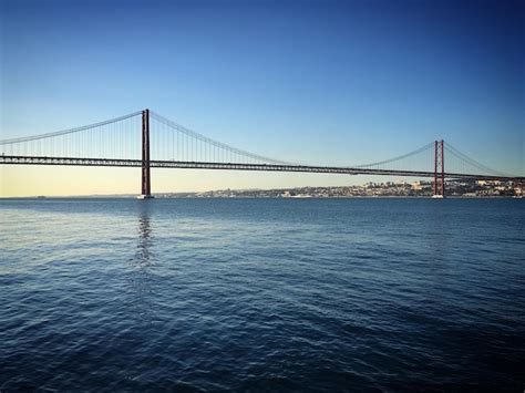 Premium Photo 25 De Abril Bridge Over The Tejo River In Lisbon