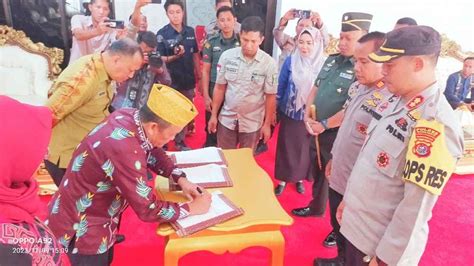 Pj Bupati Konawe Teken Nphd Pengamanan Pilkada Serentak