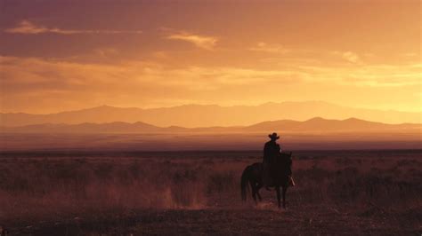 Slow Motion Shot Of A Cowboy Riding A Horse Youtube