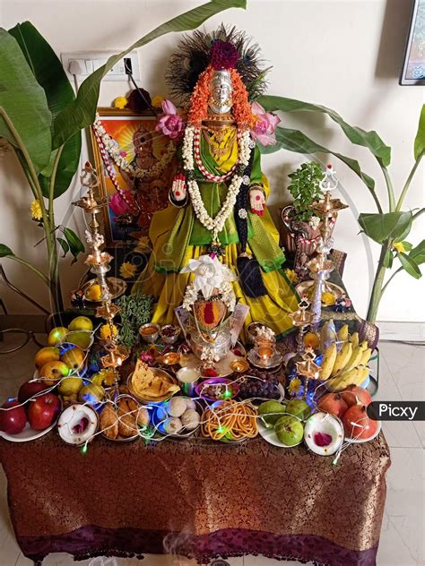 Image Of Celebrating Traditional Varalakshmi Vratam Pooja In Home