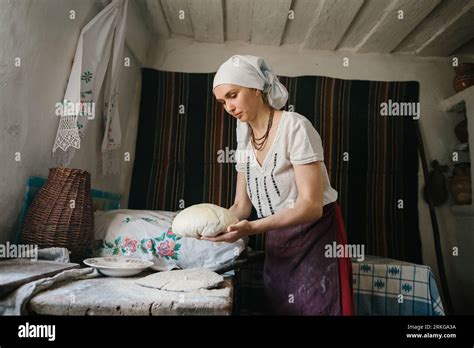 The Process Of Baking Homemade Bread In Wood Fired Ovens Stock Photo