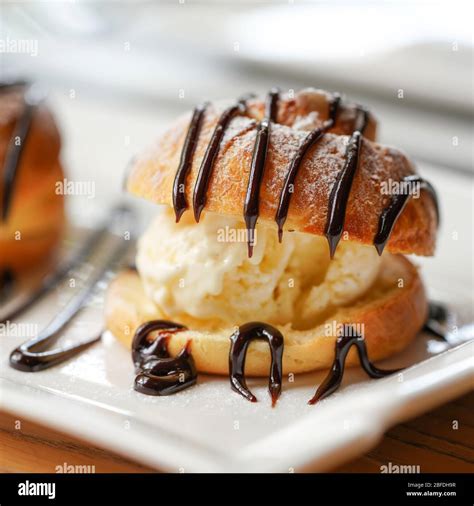 Profiterole A Filled French Choux Pastry Ball With A Typically Sweet