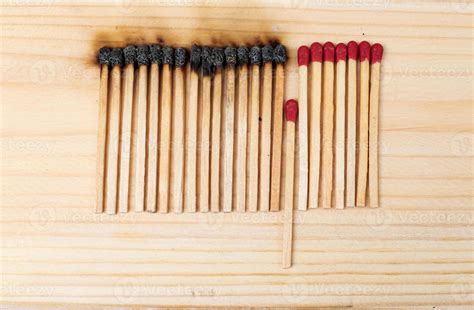 Row Of Burning Matches And All Matches On White Background Spread Of