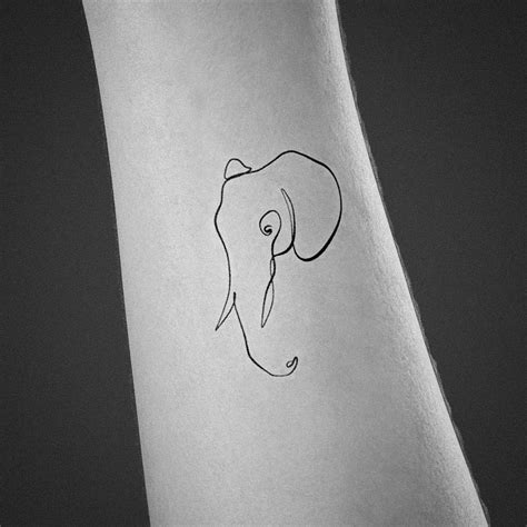 Simple Elephant Outline Tattoo Design | Inku Paw