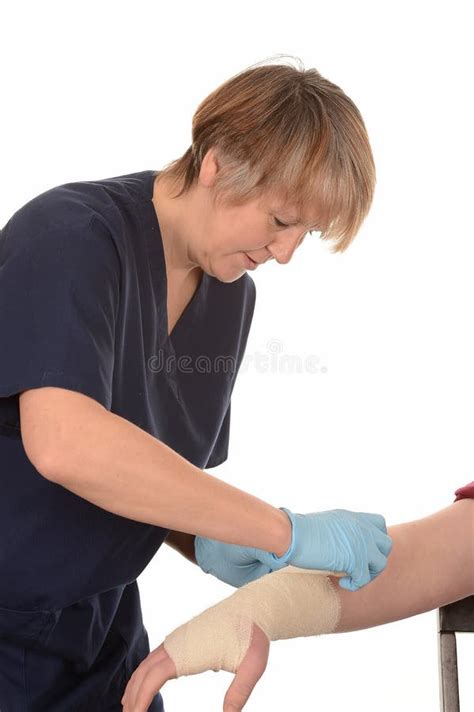 Nurse Bandaging Patient Stock Photo Image Of Pediatrician